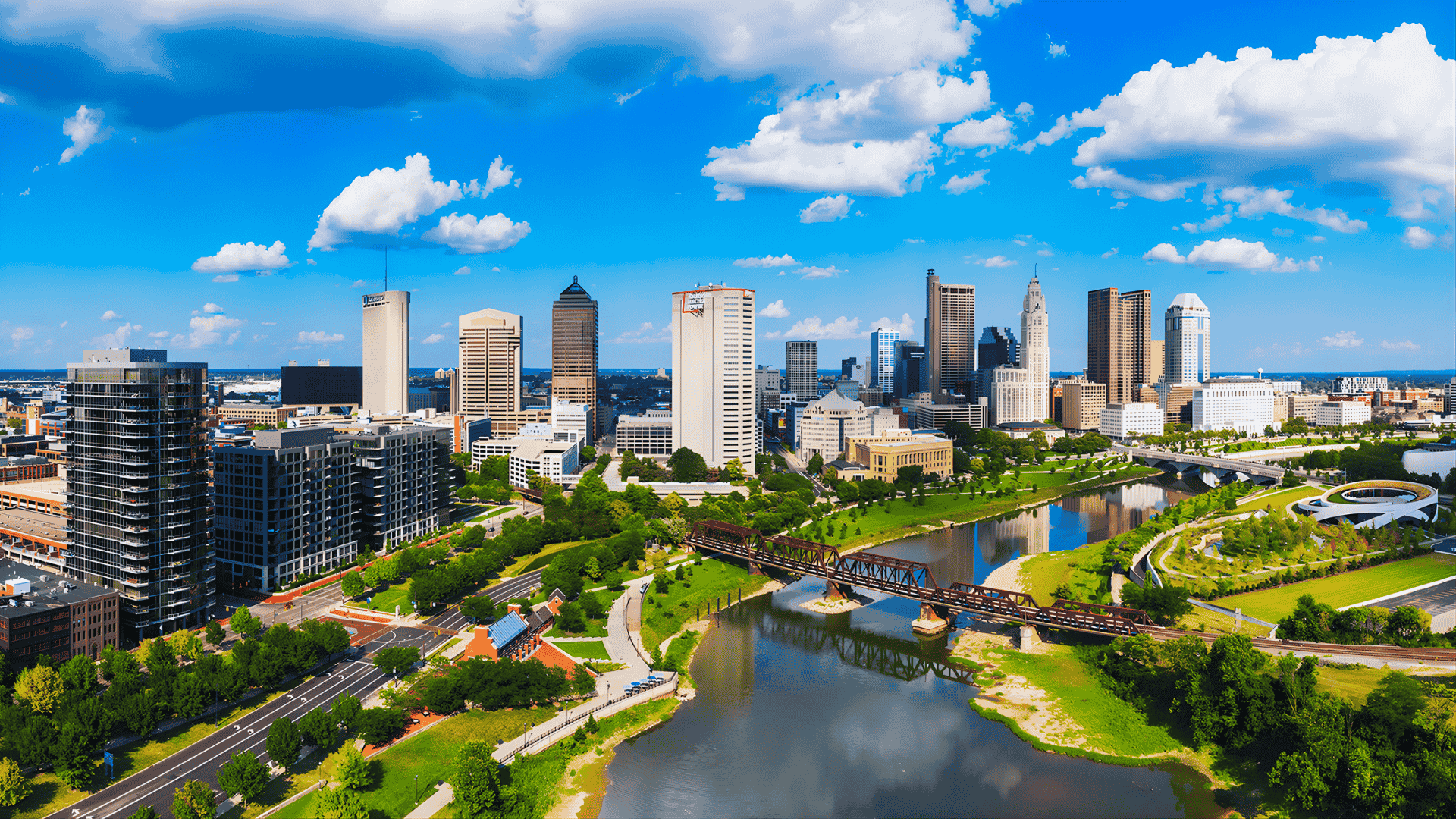 Aerial view of the Columbus, Ohio skyline with the river curving past downtown towers
